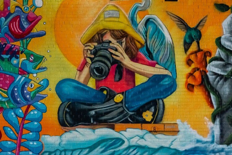 Collaboration, diversity, inclusion, and unity all are themes for the murals in the alley.