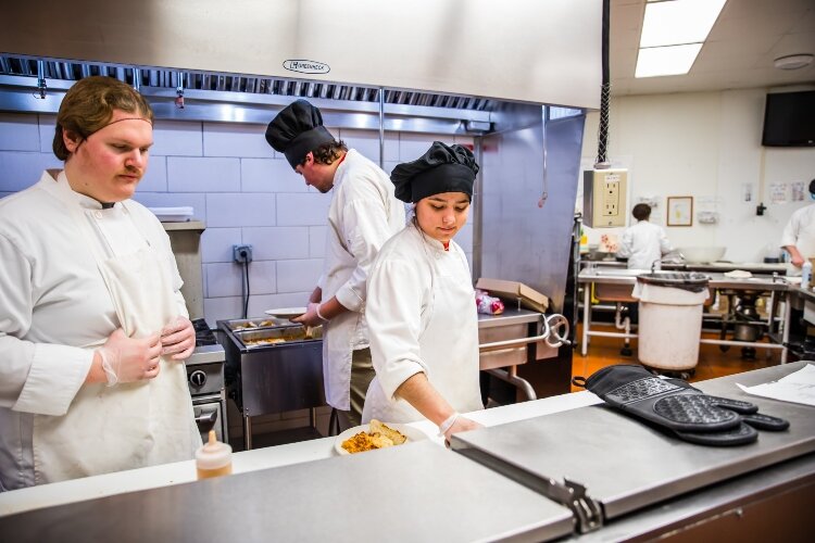 The chefs learn real-world skills in the kitchen and in the dining room at Blooming Chefs.