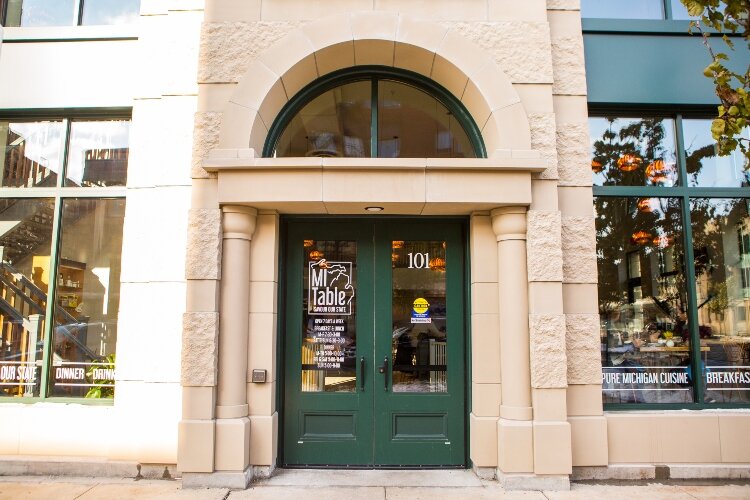 MI Table is located on the lower level of the Legacy Building in the heart of downtown, at the corner of Washington and Center avenues.