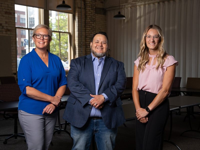 Heart of West Michigan United Way Chief Administrative Officer Becki Postma, Kent County Community Action Director Gustavo Perez, and Heart of West Michigan United Way Eviction Prevention Program Manager Alyssa Bryan.
